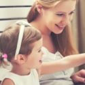 little-girl-and-woman-pointing-at-laptop